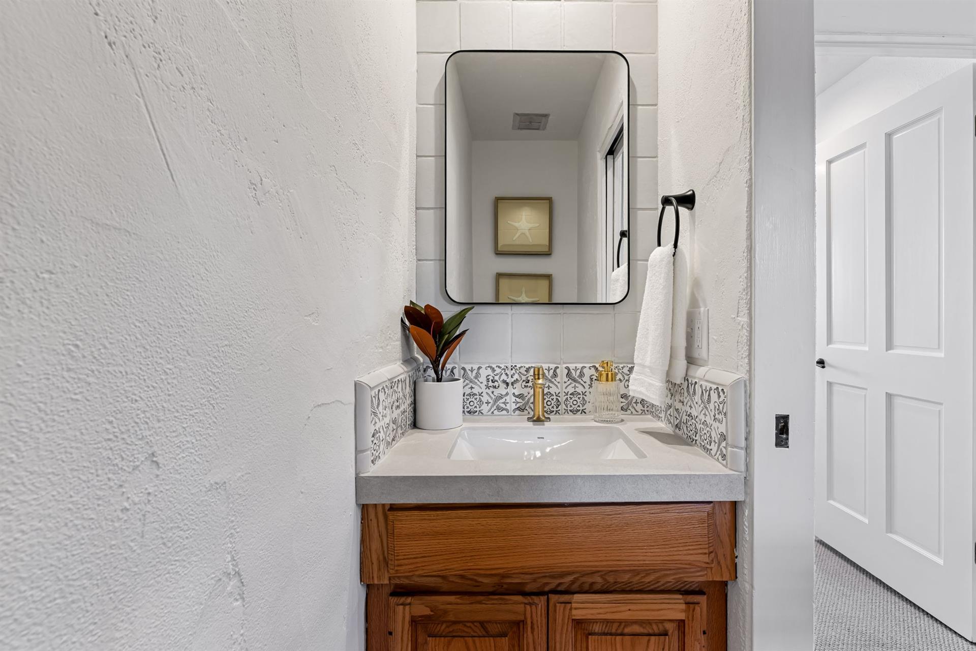 Half Bath  Powder Room Upstairs Near the Living Room