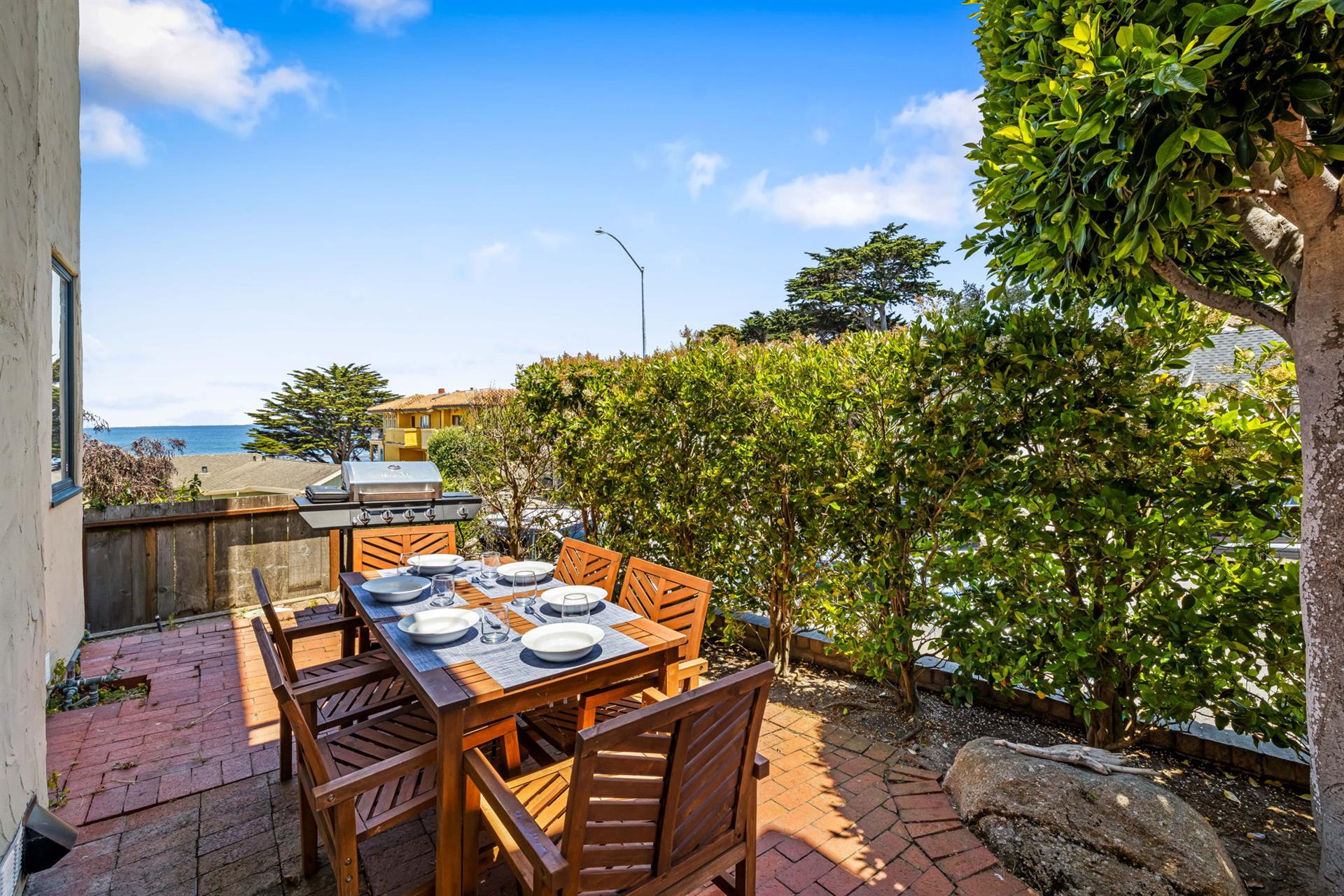 Outdoor Dining Area has a Bay View and Gas BBQ Grill