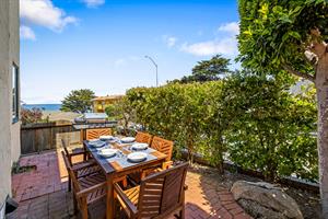 Outdoor Dining Area has a Bay View and Gas BBQ Grill