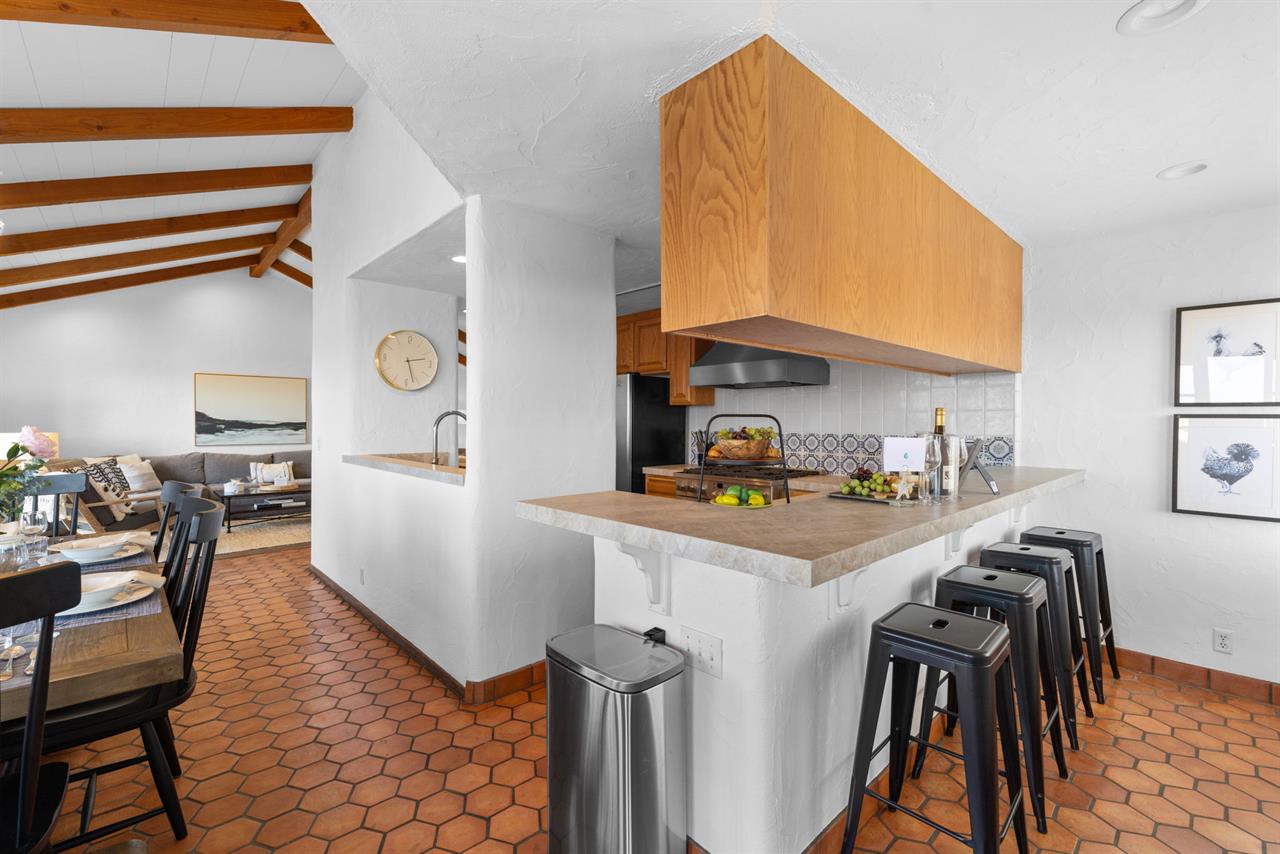 Updated Kitchen has Bar Seating and a View of the Bay