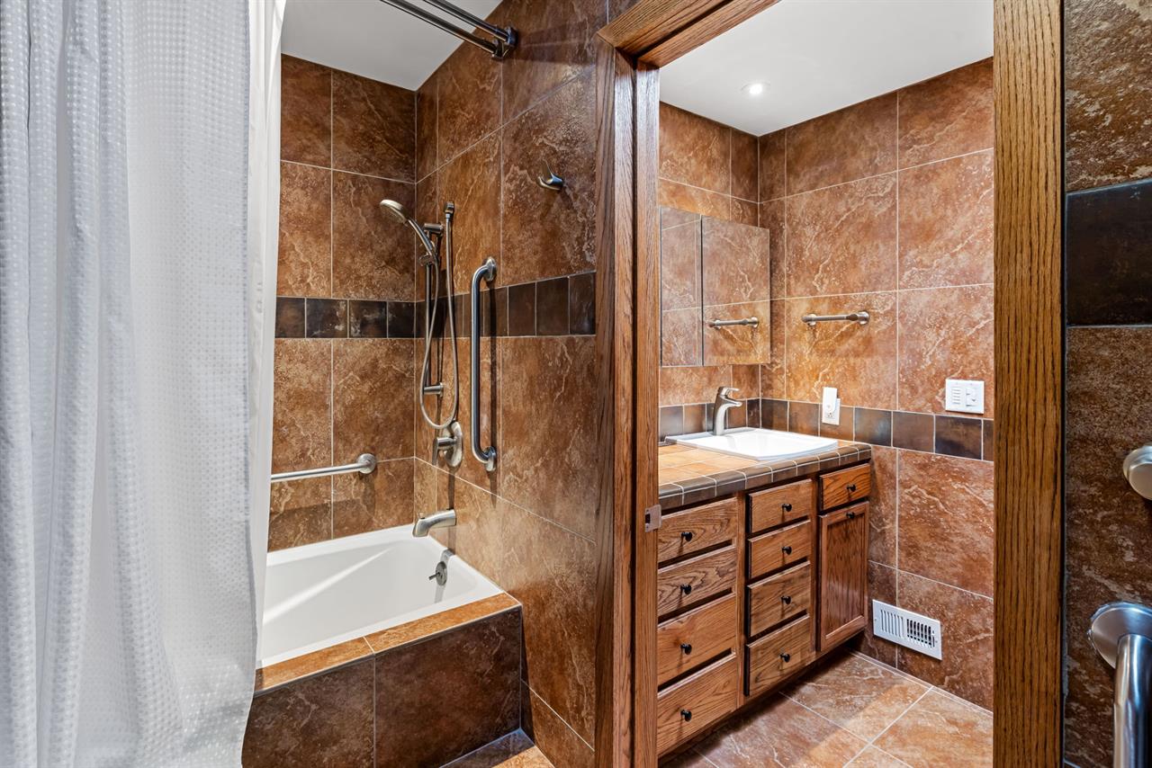 Bathroom 2 has a Shower Over Tub Combo