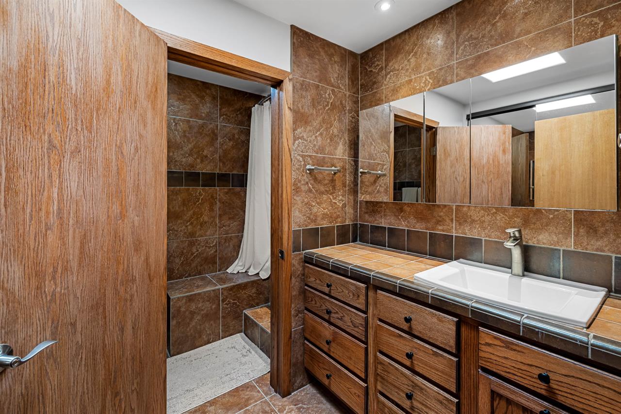 Hall Bathroom has a Shower Over Tub Combo