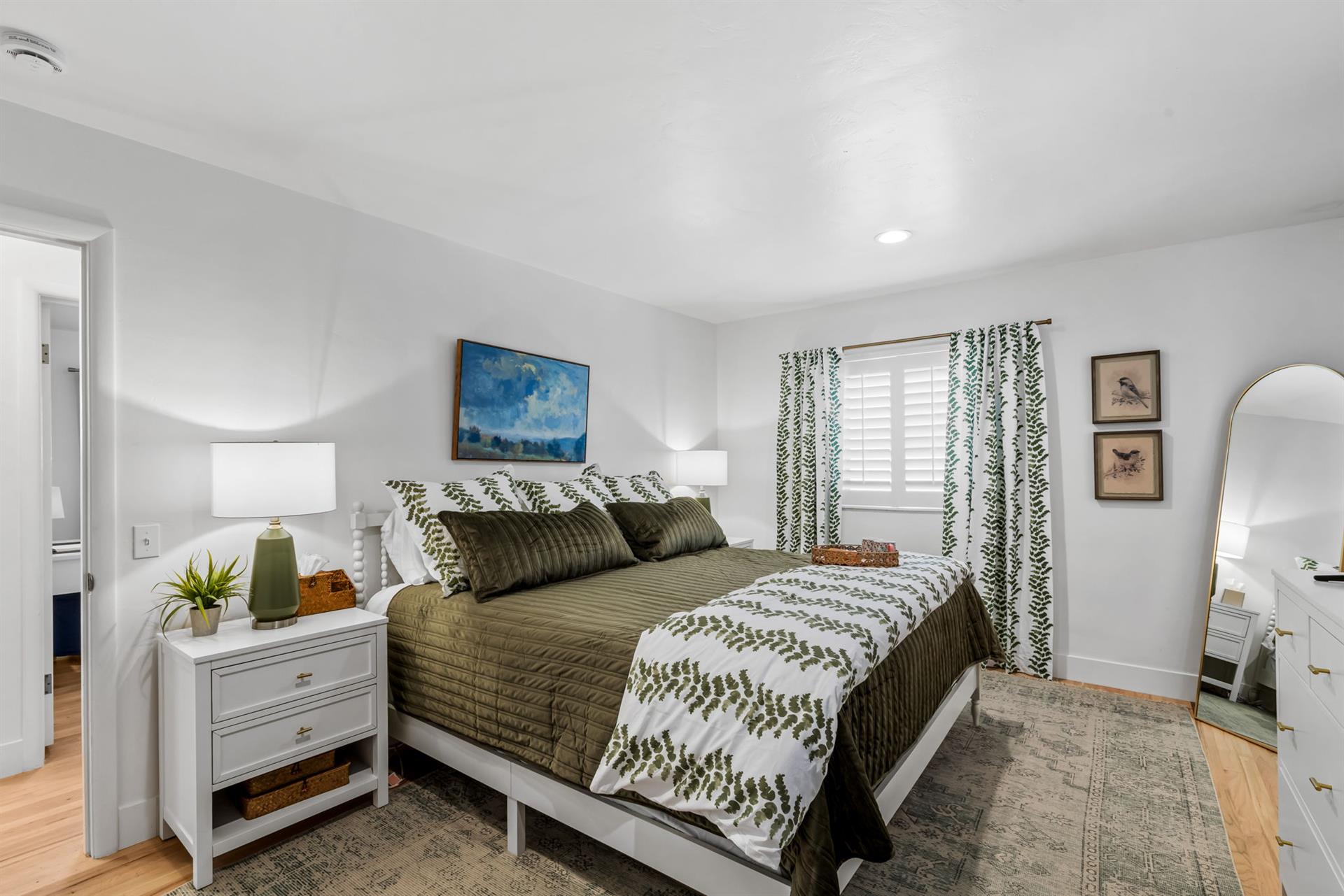 Bedroom 1 has a King Bed and EnSuite Bath