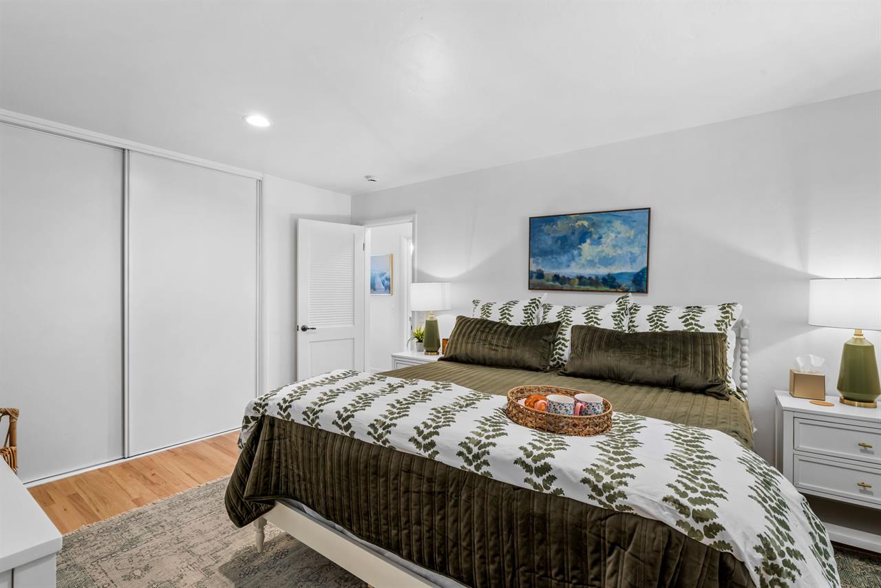 Bedroom 1 has a King Bed and EnSuite Bath with a Shower