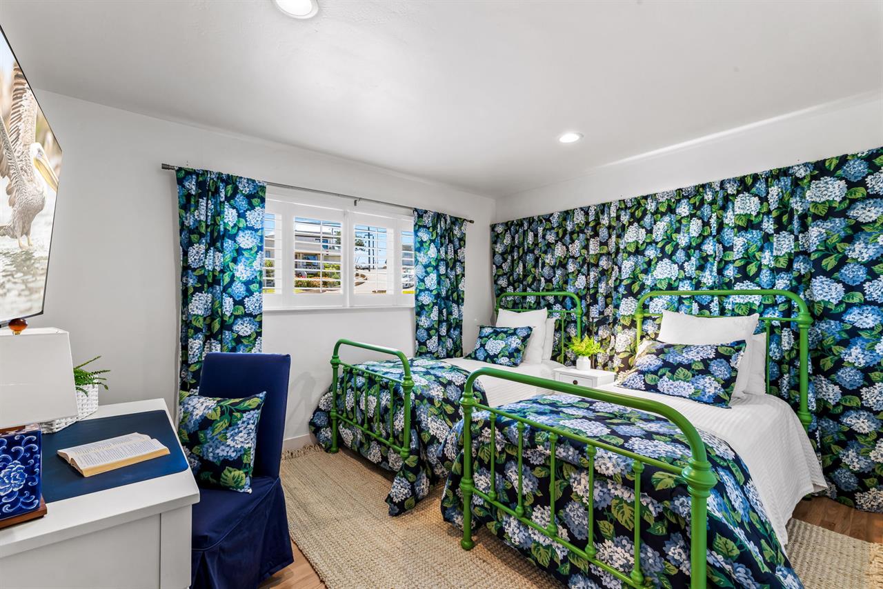 Bedroom 2 has Two Twin Beds that can also become a King Bed