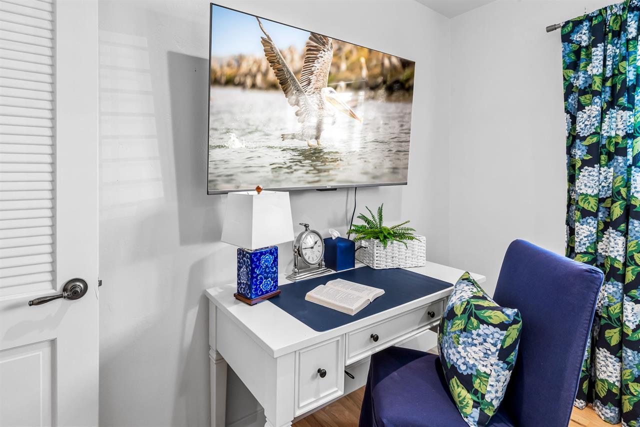 Bedroom 2 has a Desk and TV