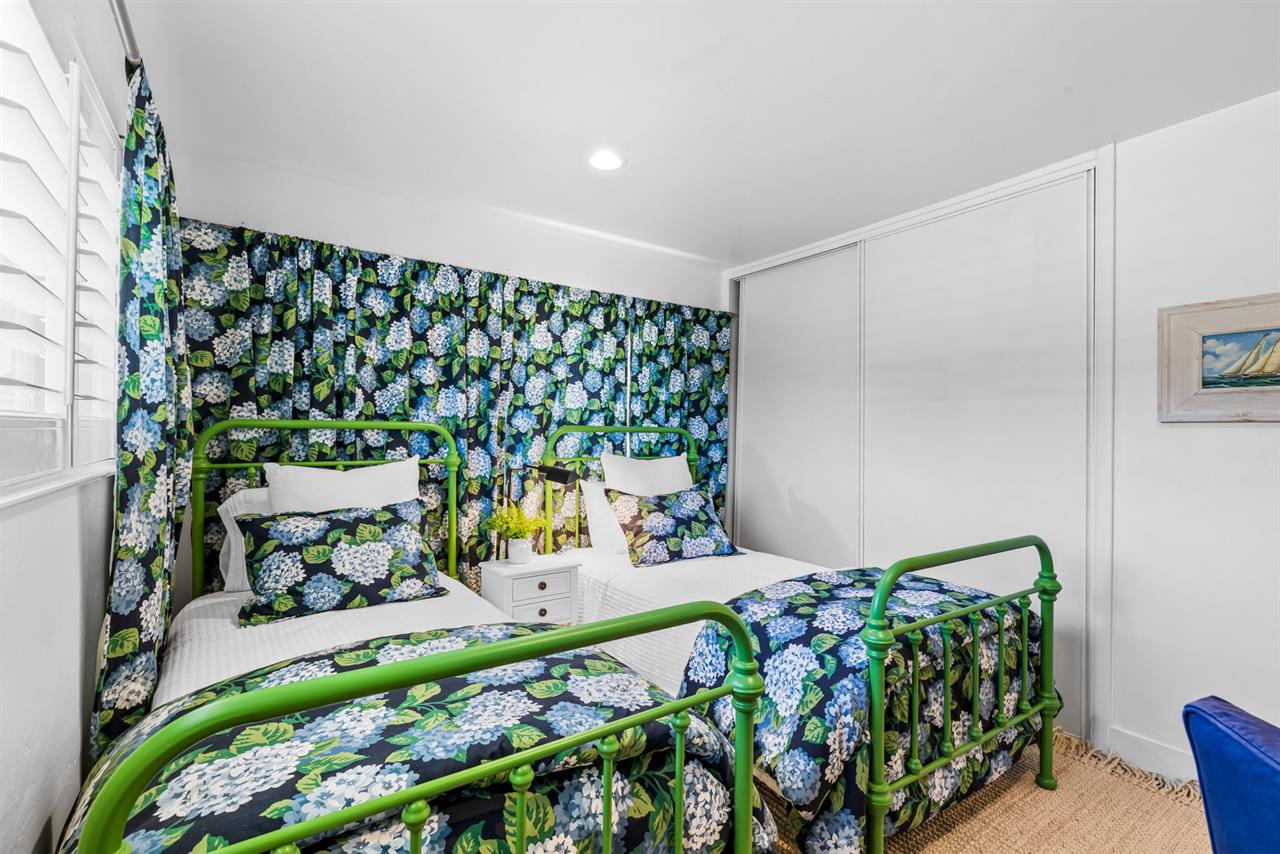 Bedroom 2 has Two Twin Beds that can also become a King Bed