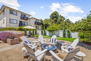 ......Gas BBQ grill,  Adirondack chairs around a Gas Fire Pit...