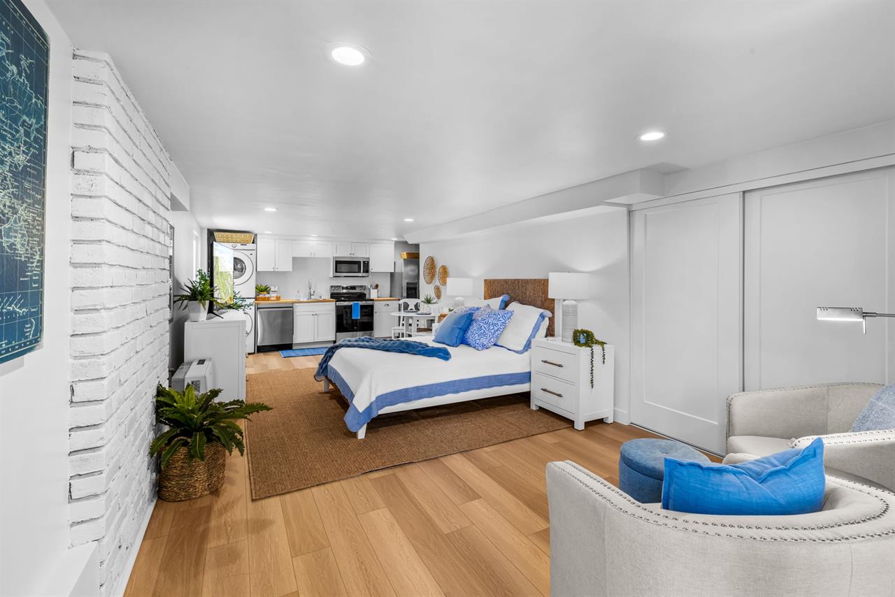 Guest Suite  Bedroom 3 has a Queen Bed, Seating Area......