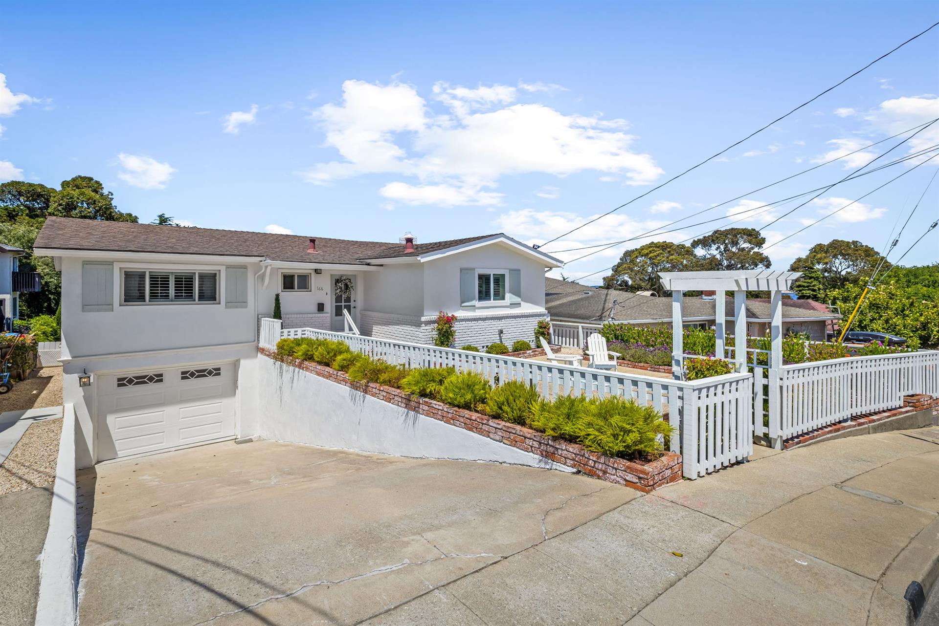 Front of the Home showing the One Car Garage