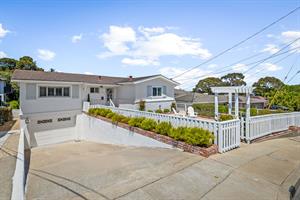 Front of the Home showing the One Car Garage