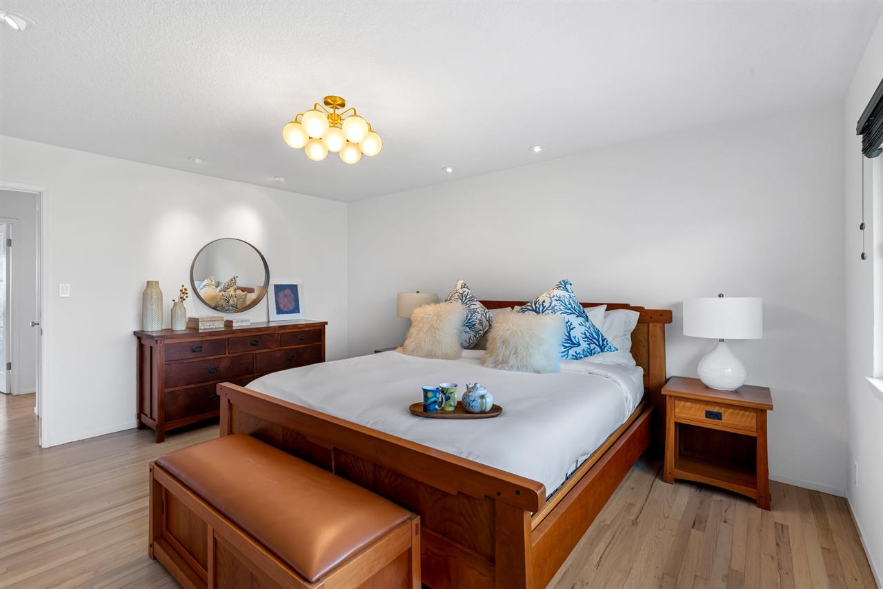 Bedroom 1 has a King Bed and an EnSuite Bath with a Shower