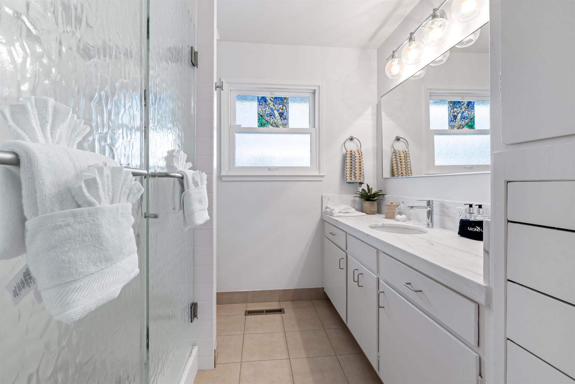 Hall Bath for Bedrooms 2 and 3 has a Shower