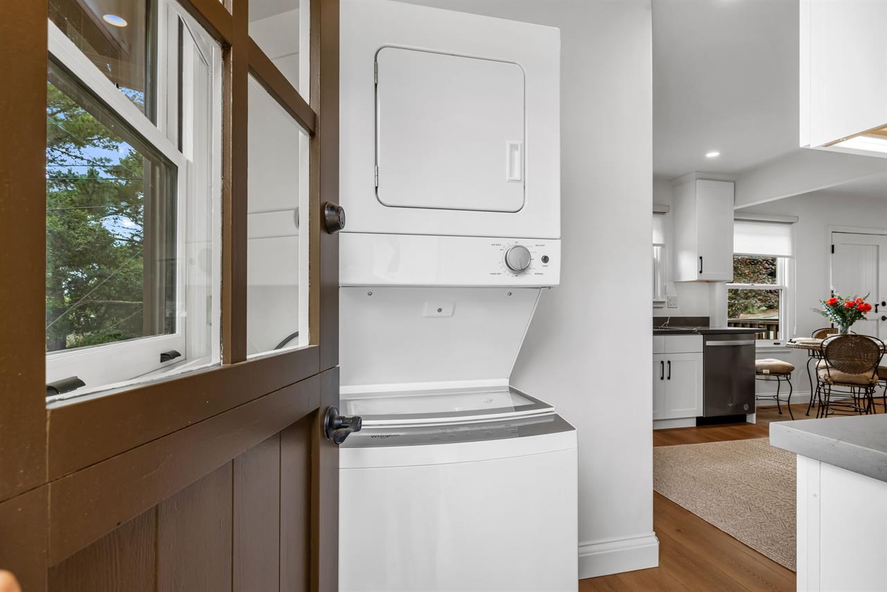 Laundry Area has a Door that Opens to the Backyard