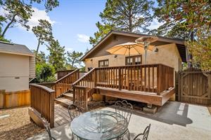 Back of the Home Showing the Deck and the Dining Patio