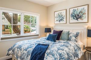 Bedroom 1 has a Queen Bed, HDTV and an En Suite Bathroom