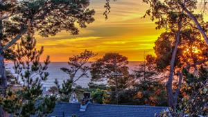 Zoom Photo of the Distant Ocean View at Sunset