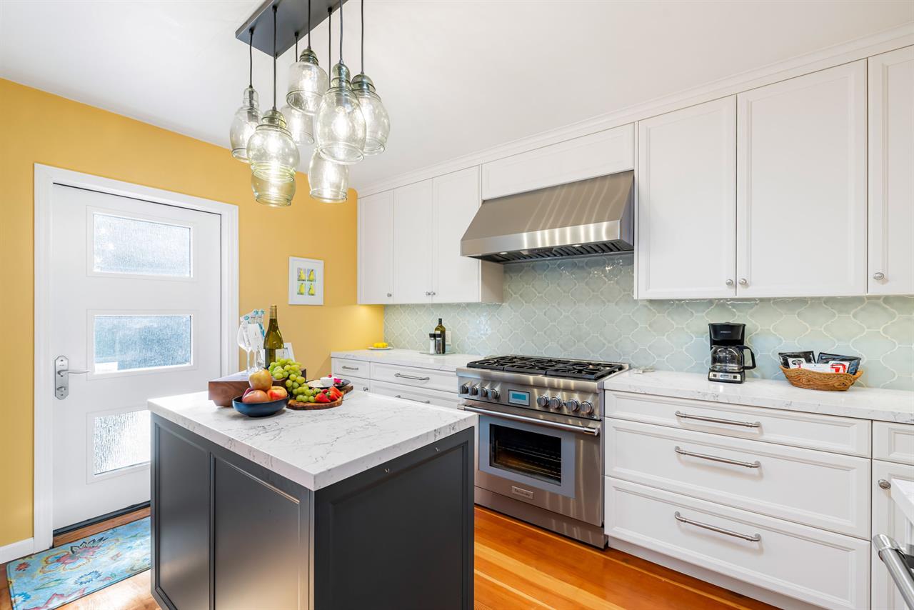 Fully Equipped Kitchen Opens to the Outdoor Dining Deck