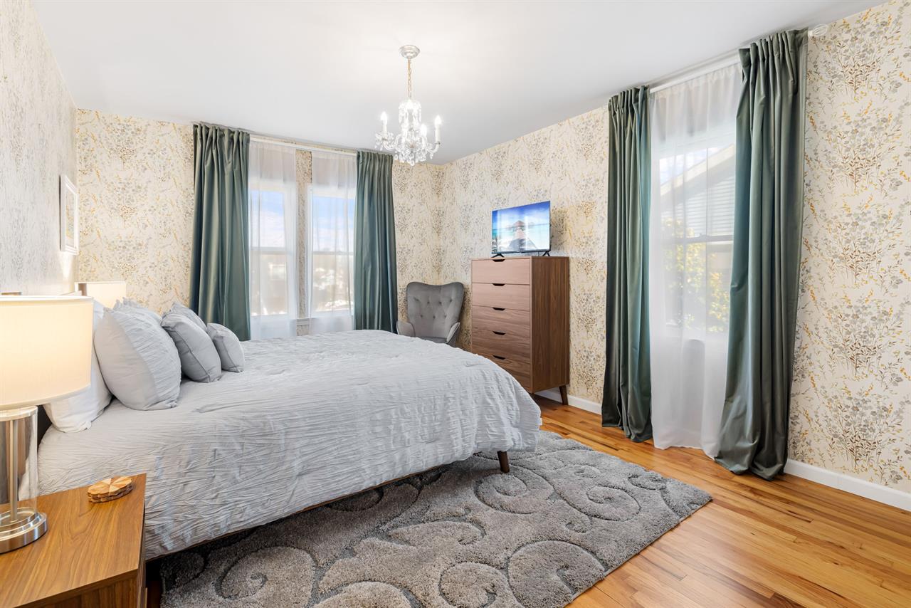 Bedroom 2 with a Queen Bed and TV