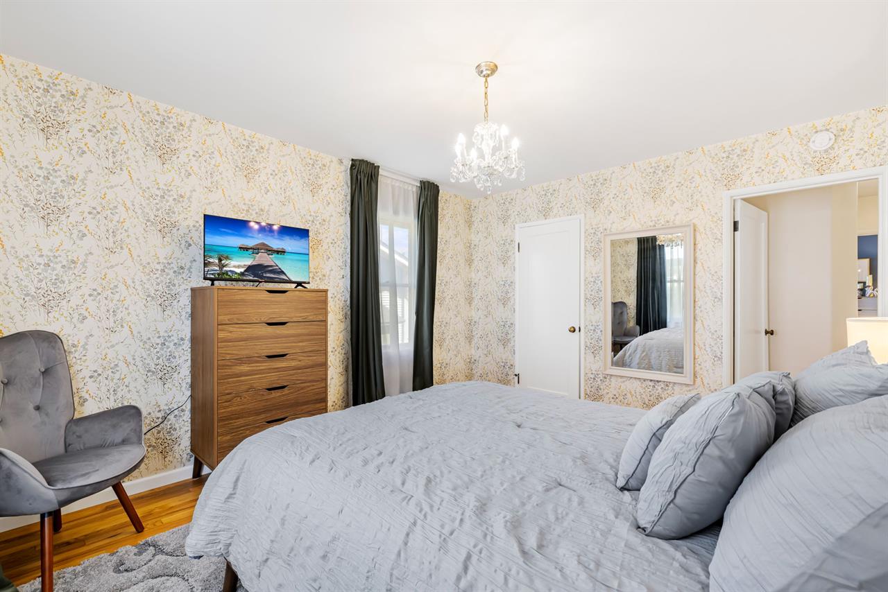 Bedroom 2 with a Queen Bed and TV