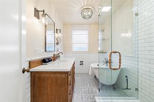 Hall Bathroom has a Shower and a Separate Tub