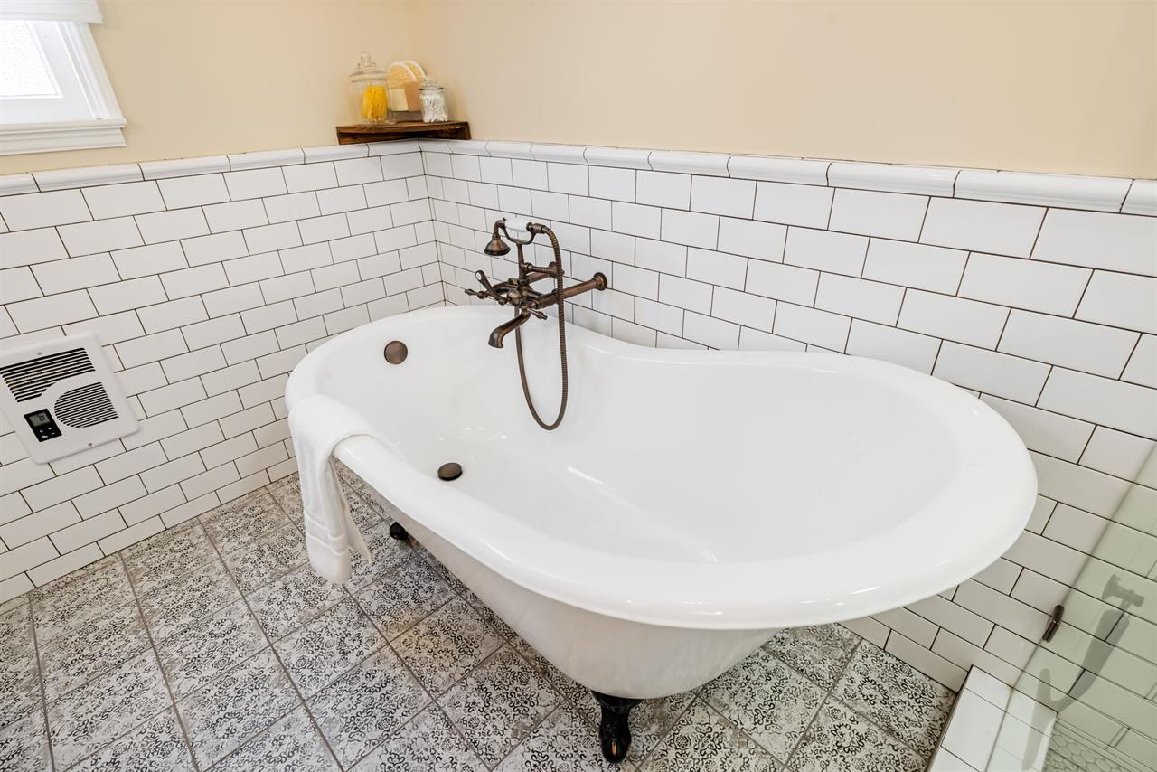 Hall Bathroom has a Shower and a Separate Tub