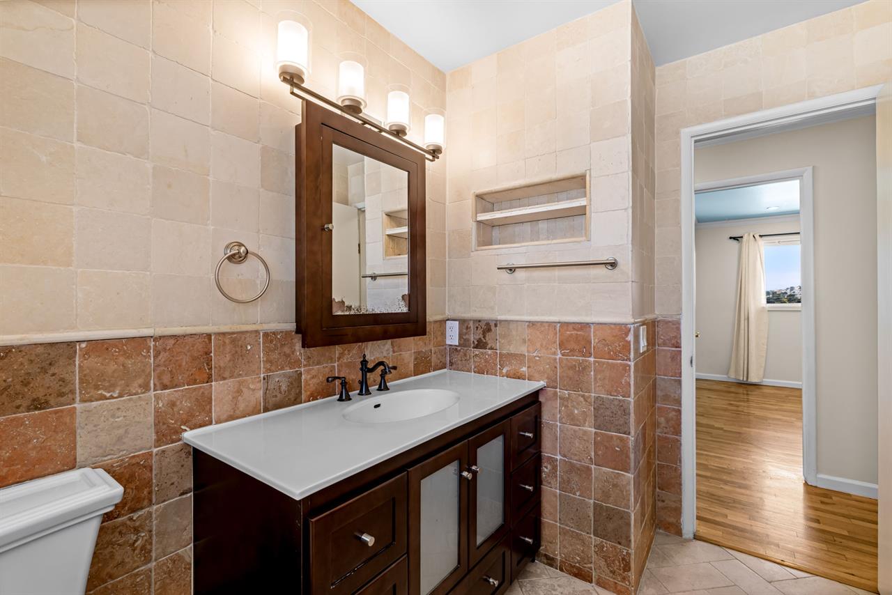 Hall Bathroom has a Shower Over Tub Combo