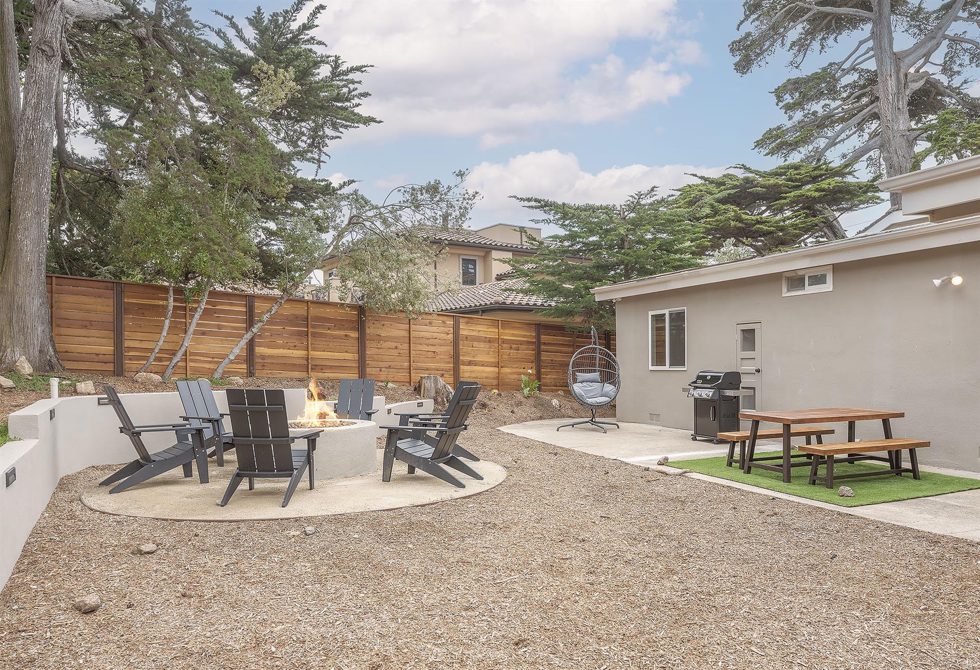 Fenced Back Yard with Seating, Fire Pit and Gas BBQ
