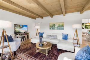 Living Room has a WoodBurning Fireplace and Roku TV