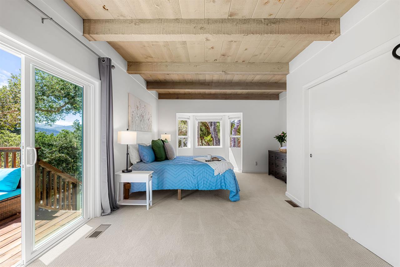 Bedroom 1 has a King Bed and EnSuite Bath with a Shower