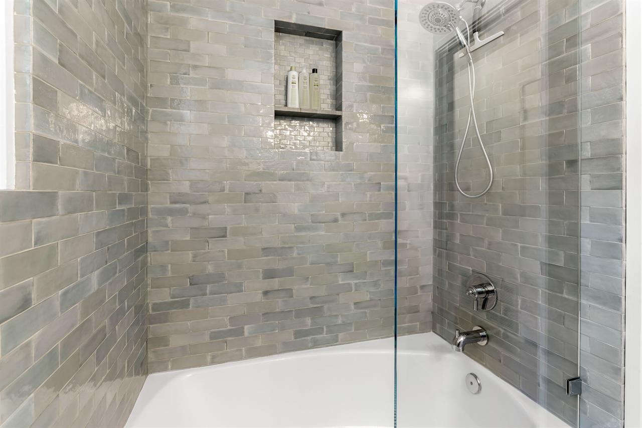 Shower Over Tub Combo in the Hall Bathroom