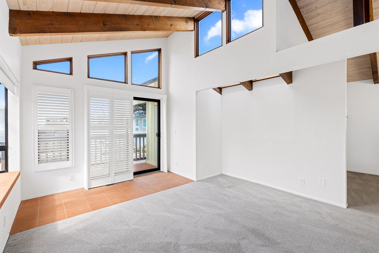 LightFilled Bedroom with a Vaulted Ceiling