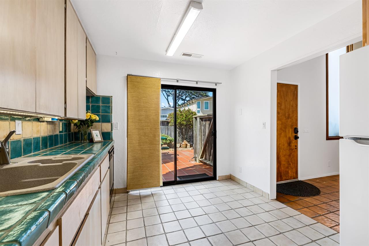 Kitchen has Sliders to an Outdoor Dining Area