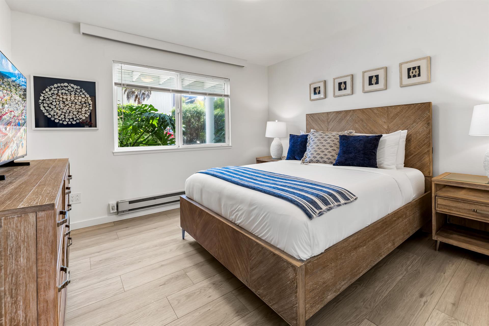 Bedroom 2 with a Queen Bed and TV