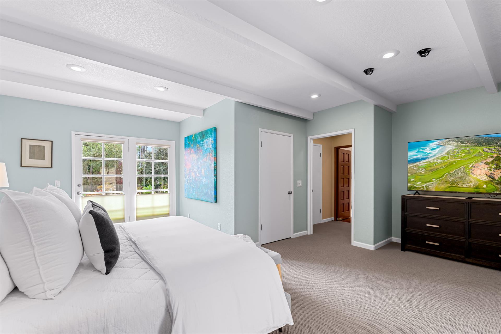 Bedroom 1 has a King Bed, EnSuite Bath, TV With Streaming