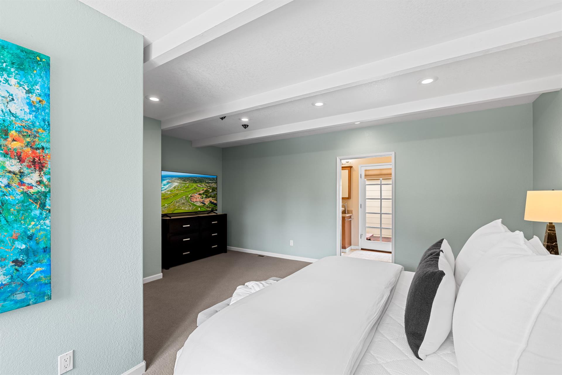 Bedroom 1 has a King Bed, EnSuite Bath, TV With Streaming