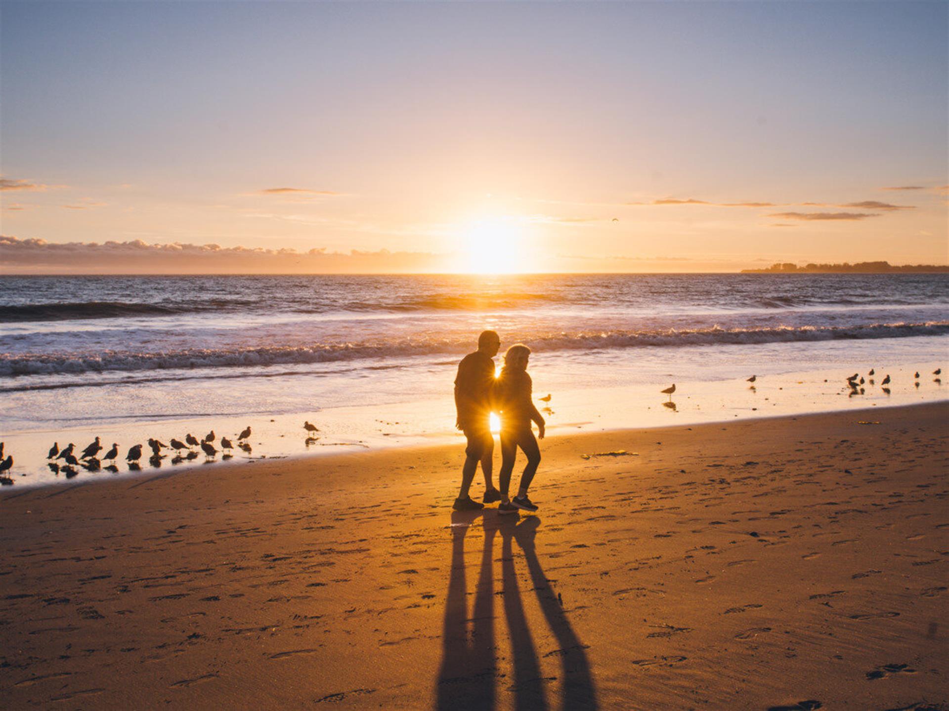 A Sunset Walk on a Beach  So Romantic