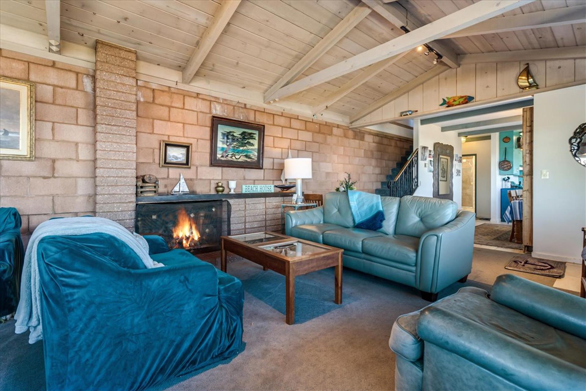 Living Room  Vaulted Beamed Ceilings, WoodBurning Fireplace