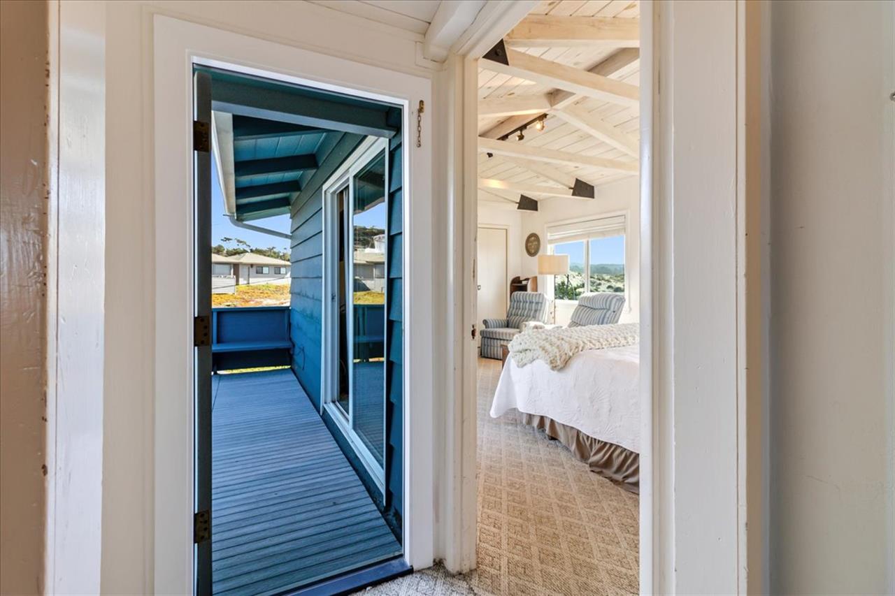 Entry Into Bedroom 1 Showing Its Sliders to the Private Deck