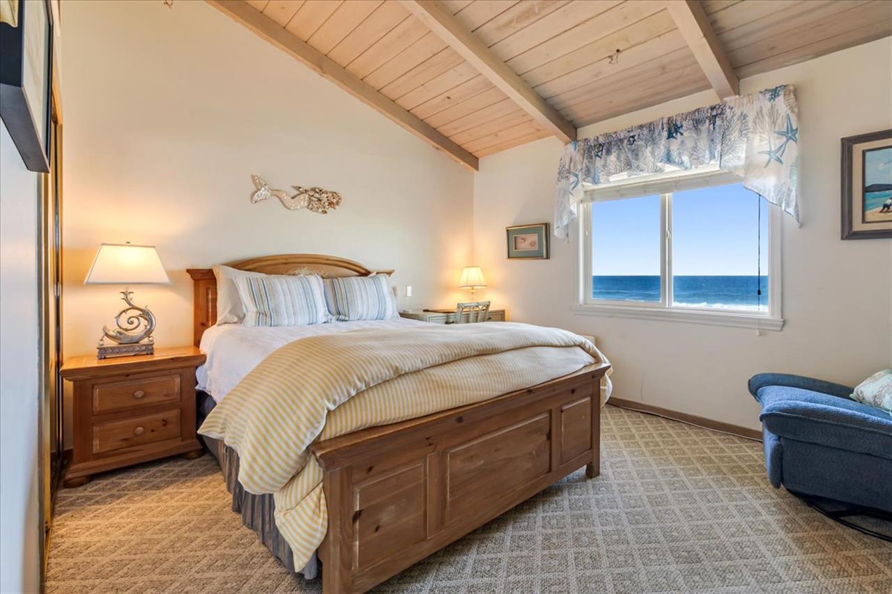 Bedroom 2 has a Queen Bed and a Bay View