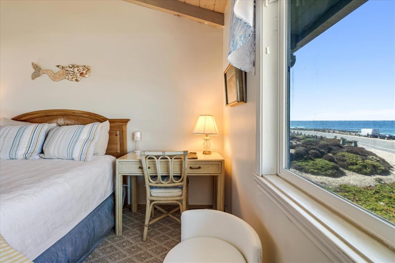 Bedroom 2 has a Queen Bed and a Satellite TV