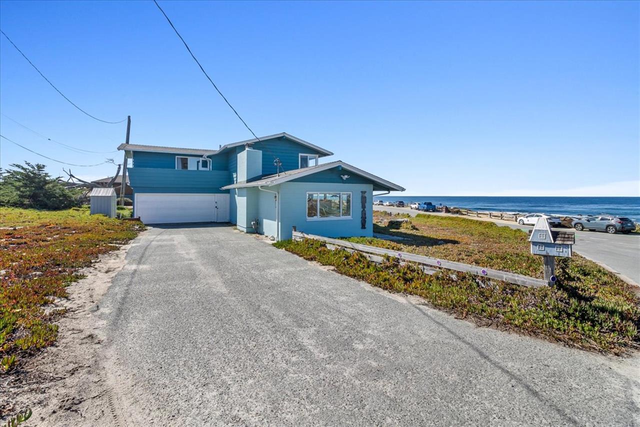 The Back of the Home has Plenty of Parking in the Driveway