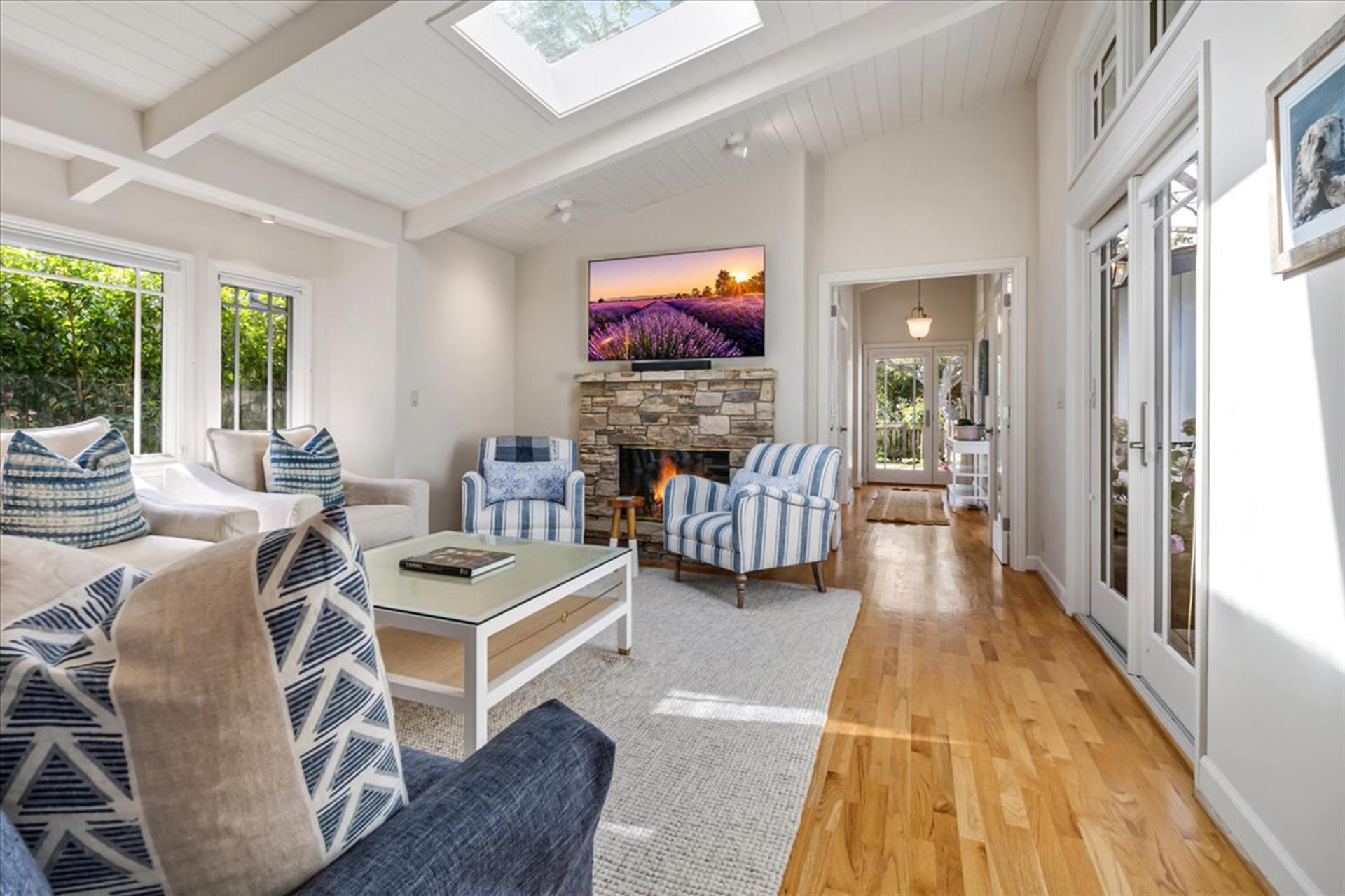 Living Room with a Gas Fireplace and TV with Cable