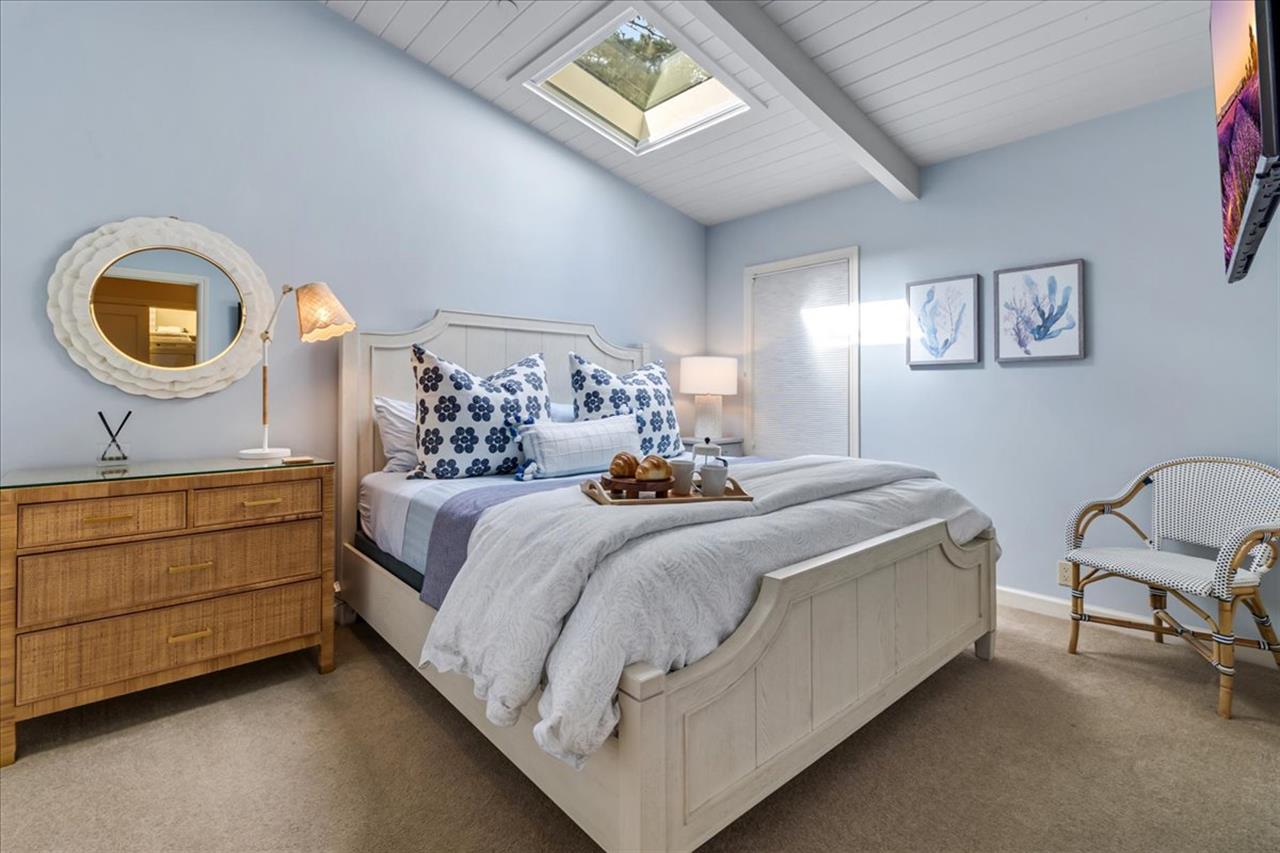 Bedroom 2 has a King Bed and WiFiEnabled TV