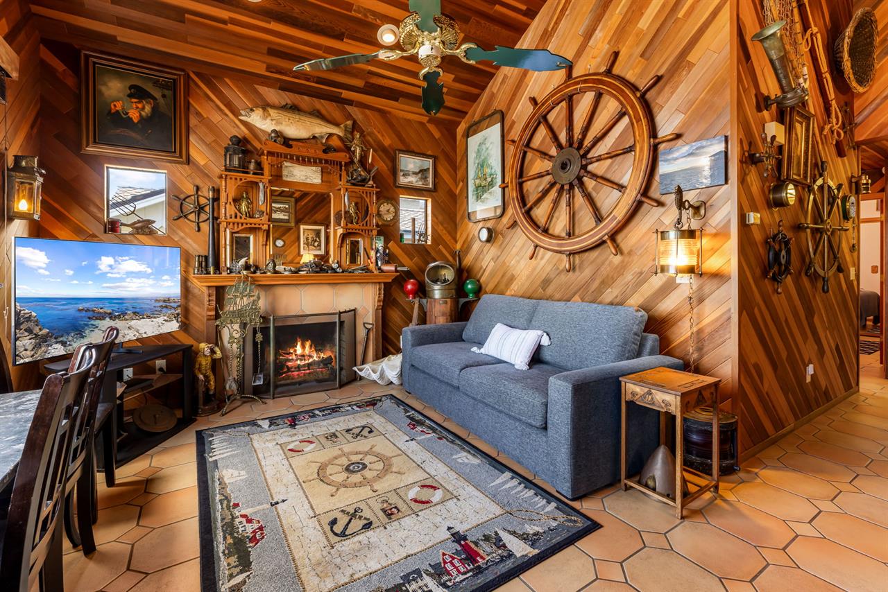 Living Room has a Wood Burning Fireplace and WiFiEnabled TV