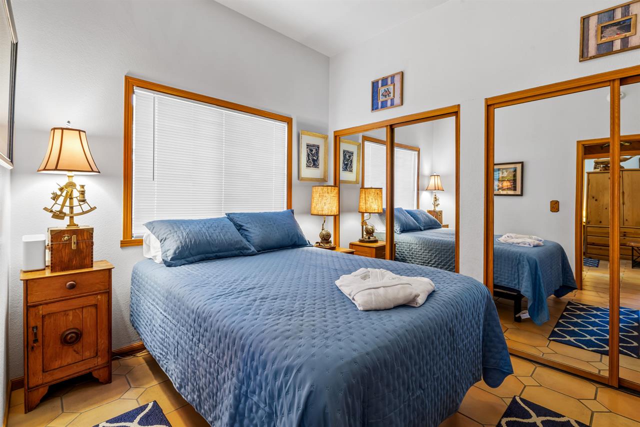 Bedroom 1 with a Queen Bed and TV