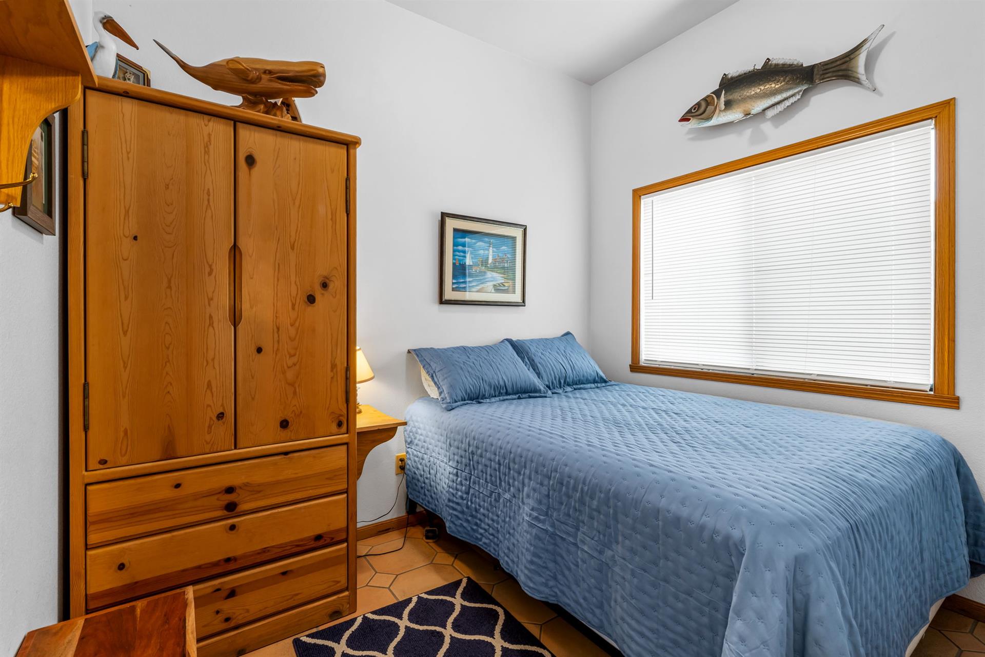 Bedroom 2 has a Queen Bed and TV