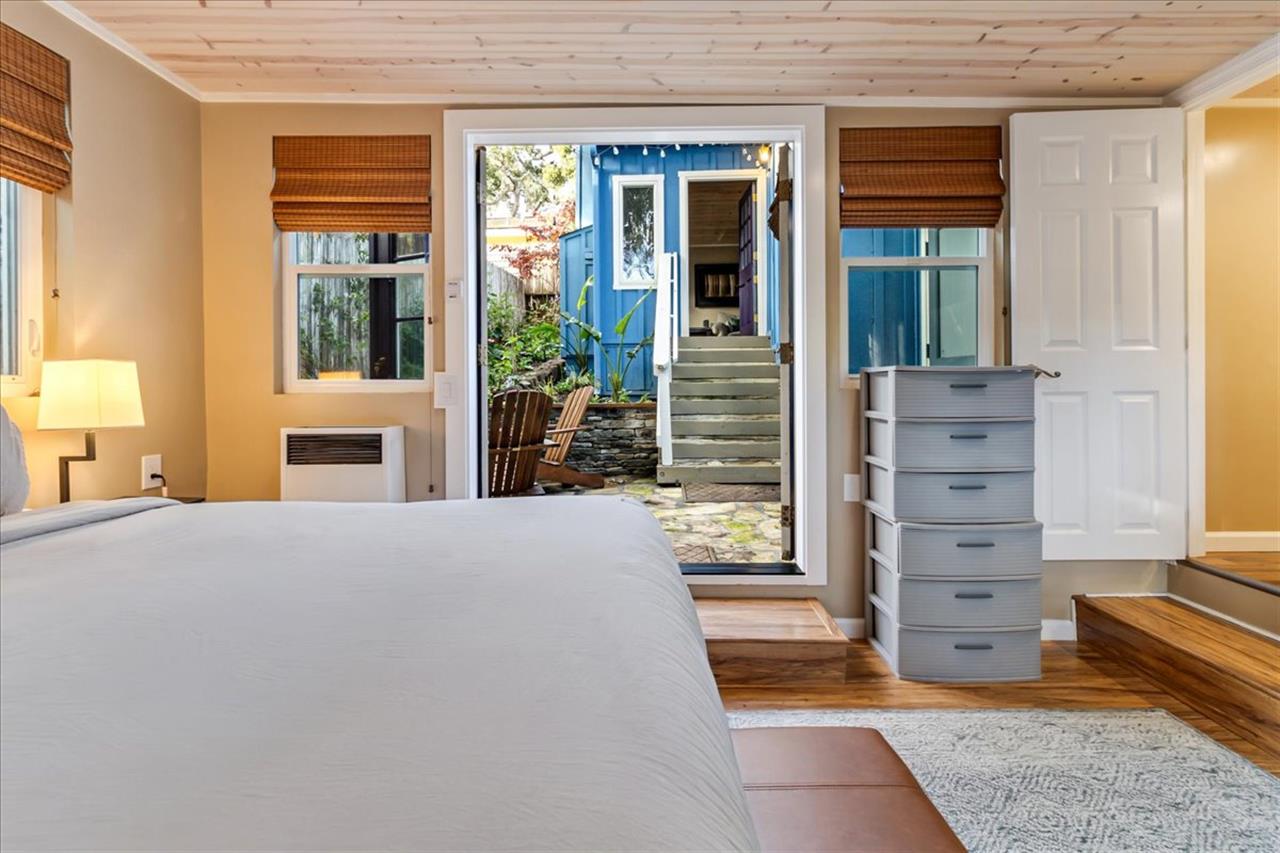 Bedroom 3  Queen Bed, TV, Desk and EnSuite Half Bath