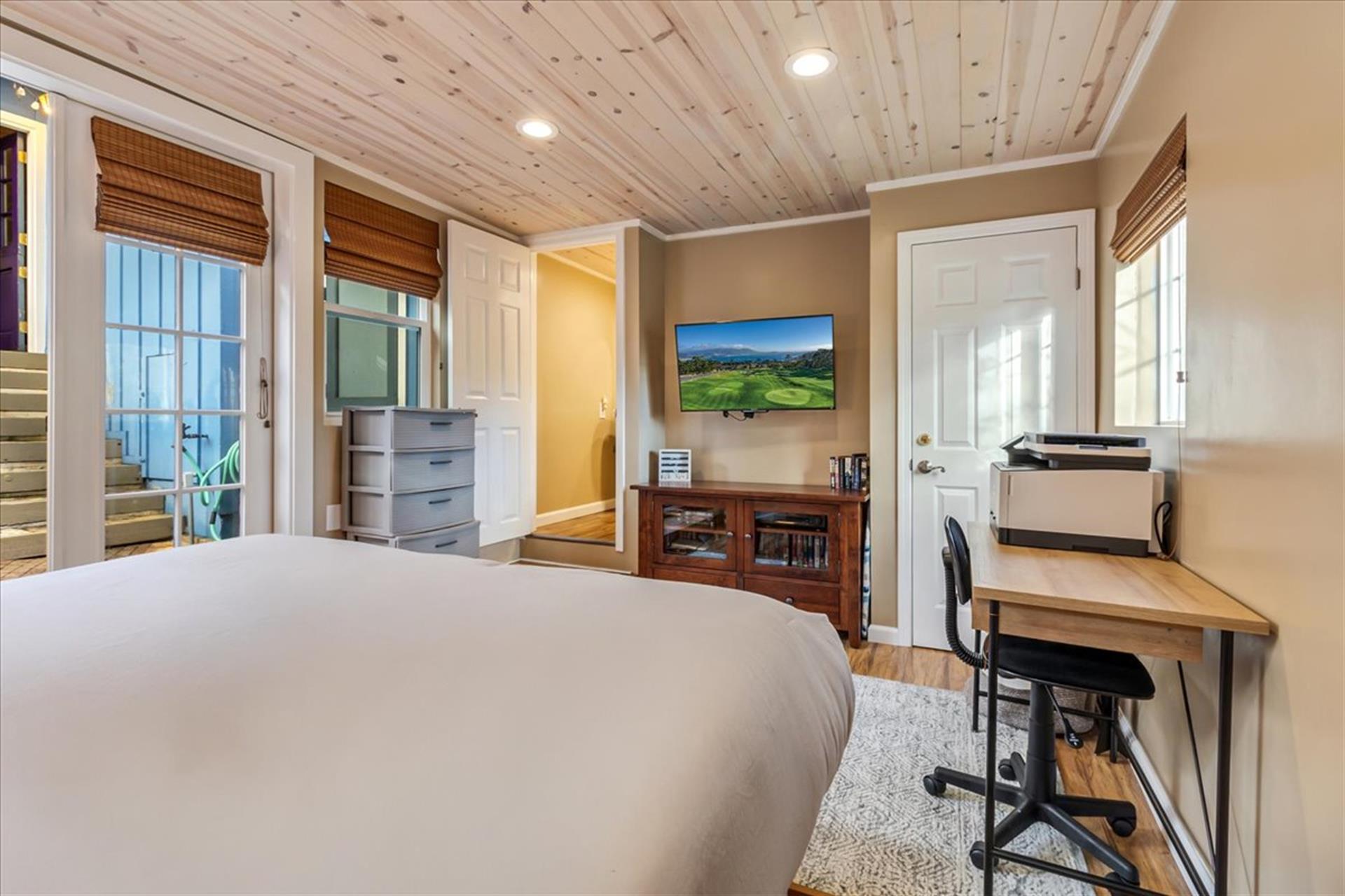 Bedroom 3  Queen Bed, TV, Desk and EnSuite Half Bath