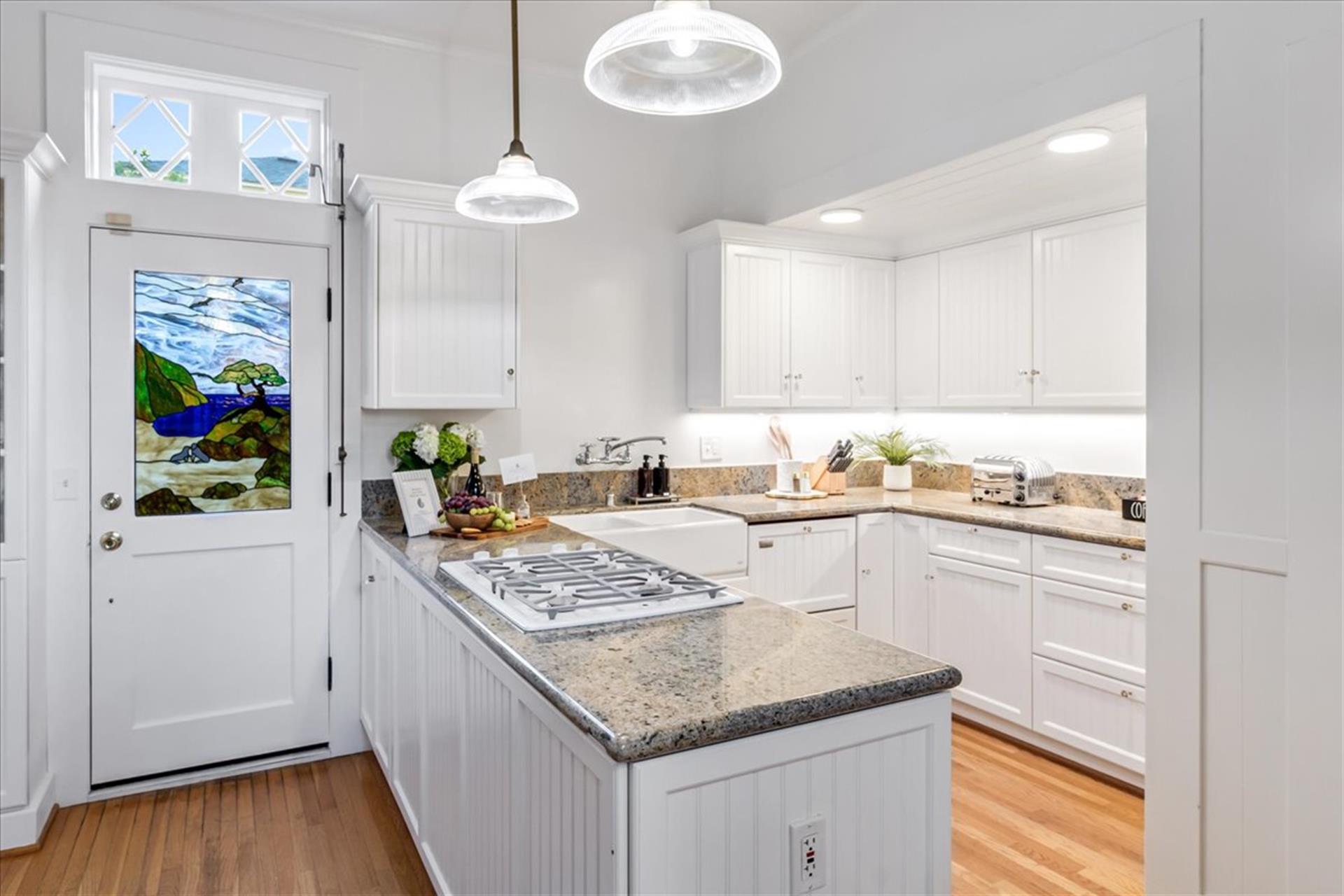 Kitchen  Notice the Beautiful Stained Glass Window